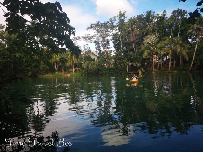Girl kayaking on Lobok river in Bohol.
