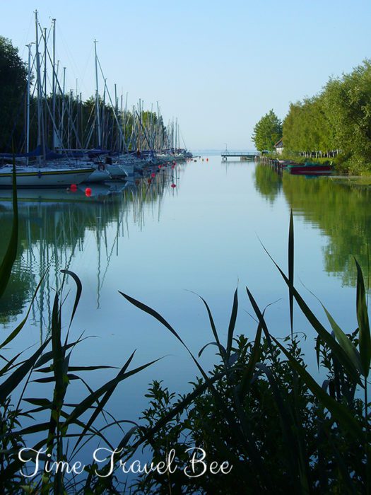 Sea of Hungary Balaton Lake with blue sky, calm waters, boats for sailing. What to see in Hungary, where to go in Hungary?